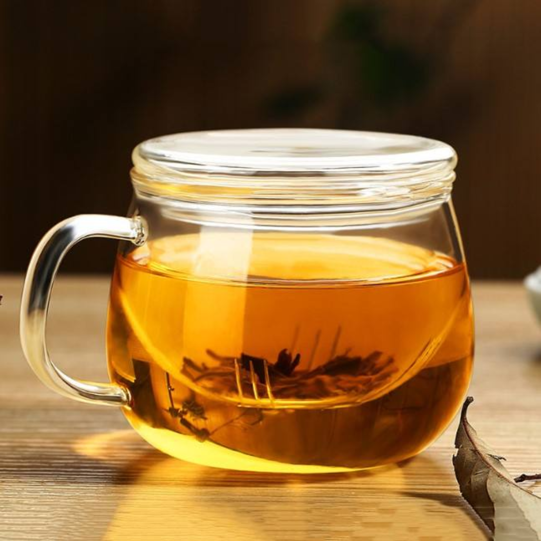 clear glass tea cup with stainless steel infuser and lid for loose leaf herbal tea berry kissed bliss
